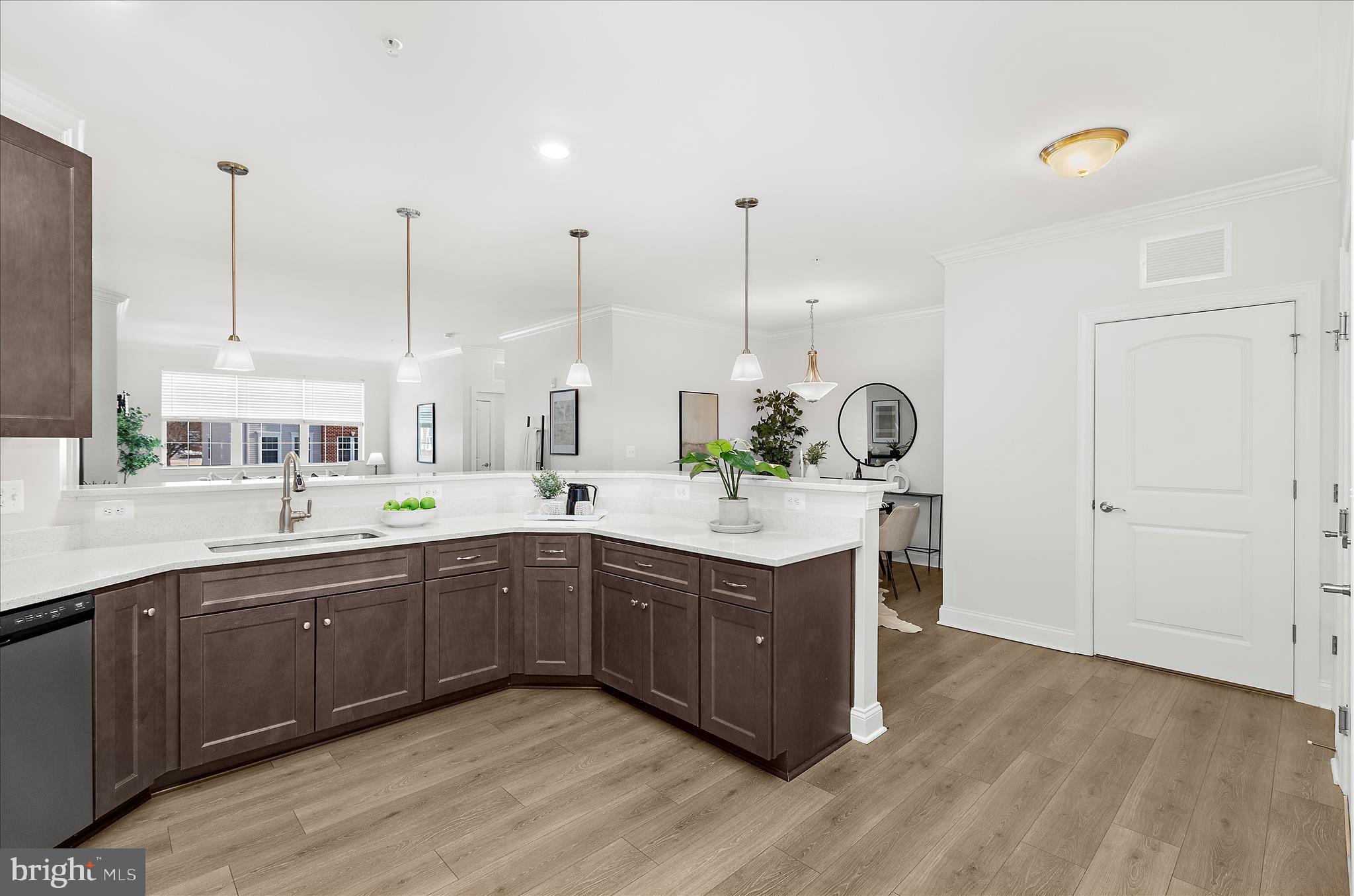 636 Wallingford Road, Unit 3J Bel Air, MD 21014 - Photo 10 of 59 a large kitchen with kitchen island a sink stainless steel appliances and cabinets
