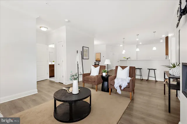 a bathroom with a double vanity sink toilet and a mirror