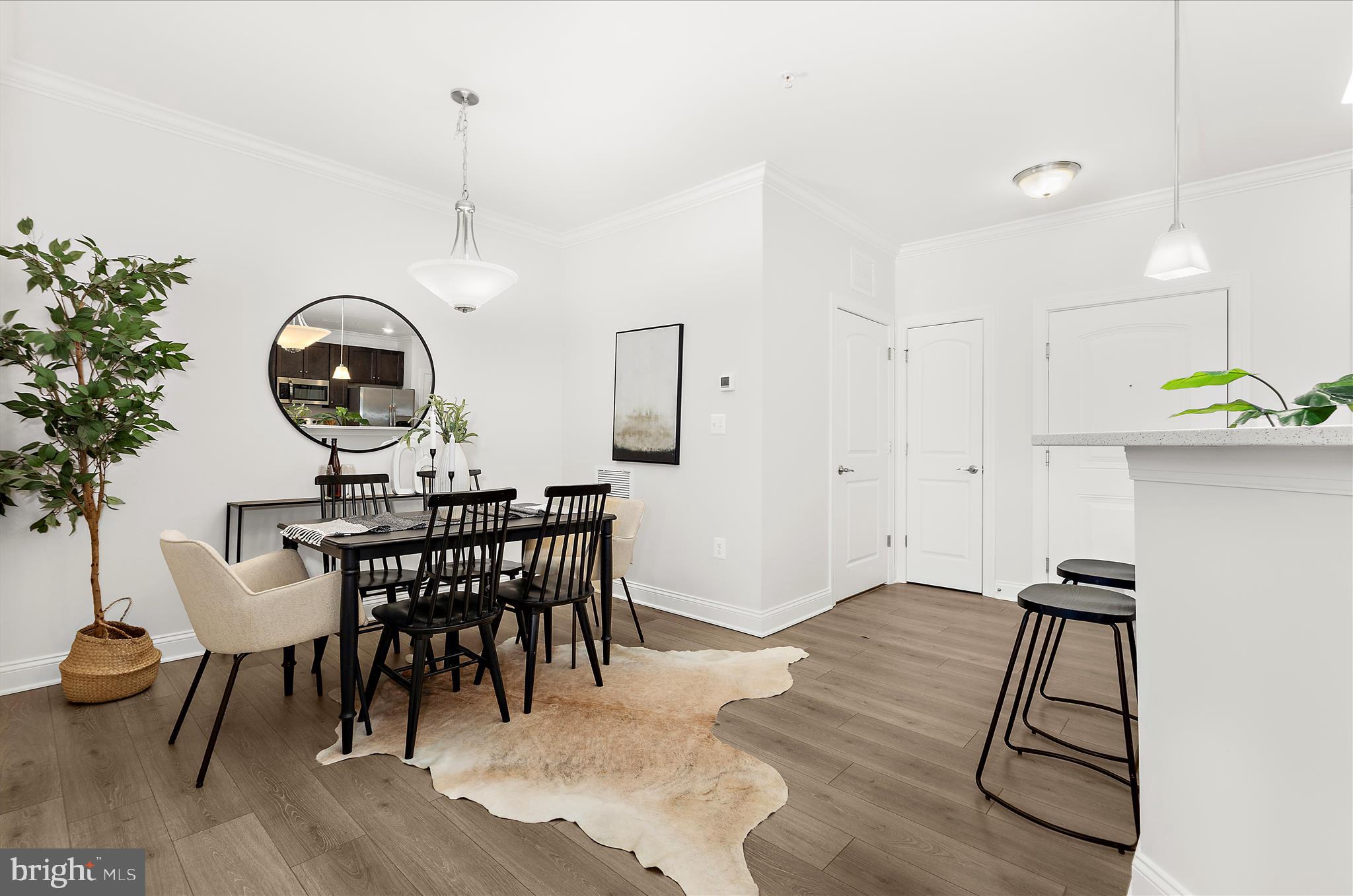636 Wallingford Road, Unit 3J Bel Air, MD 21014 - Photo 15 of 59 a view of a dining room with furniture and wooden floor