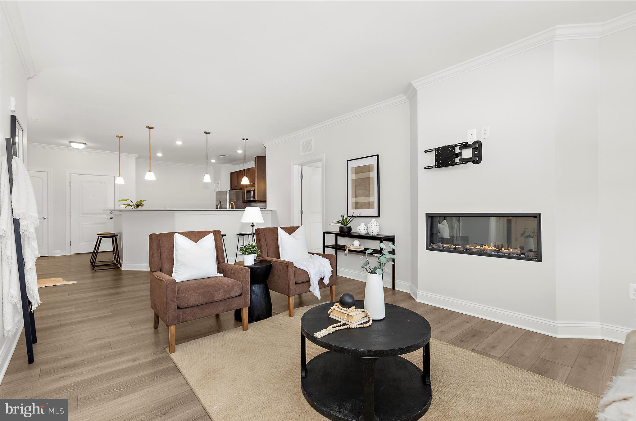 636 Wallingford Road, Unit 3J Bel Air, MD 21014 - Photo 20 of 59 a living room with furniture and a wooden floor