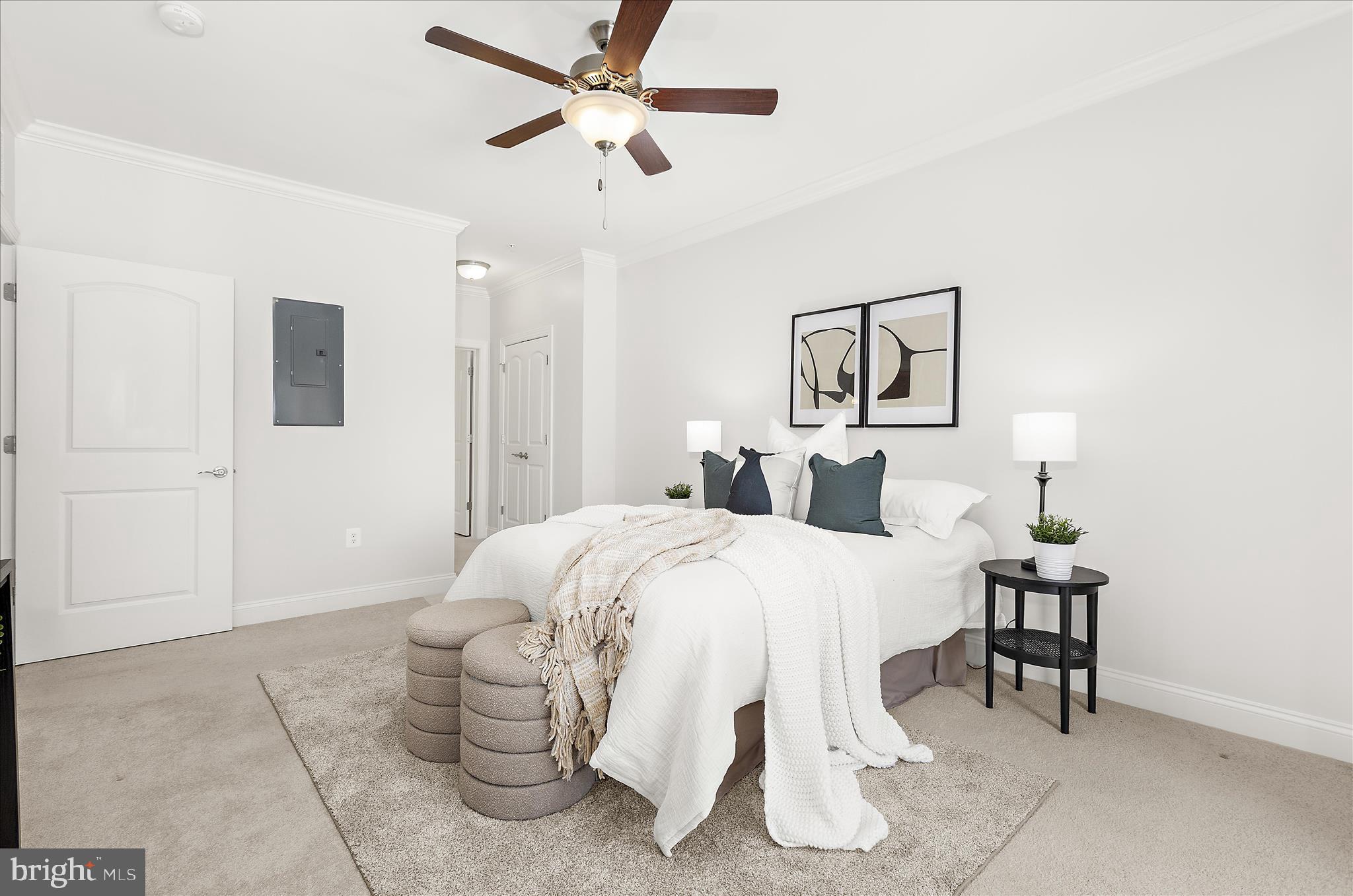 636 Wallingford Road, Unit 3J Bel Air, MD 21014 - Photo 22 of 59 a bedroom with a bed and a chandelier