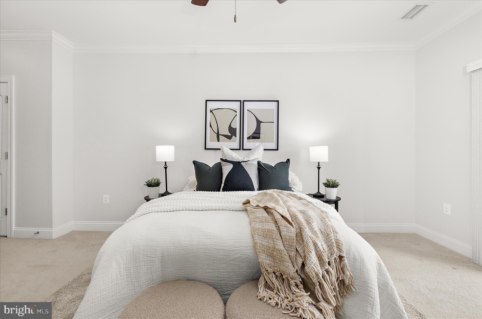 636 Wallingford Road, Unit 3J Bel Air, MD 21014 - Photo 23 of 59 a bedroom with a bed and lamp with the table