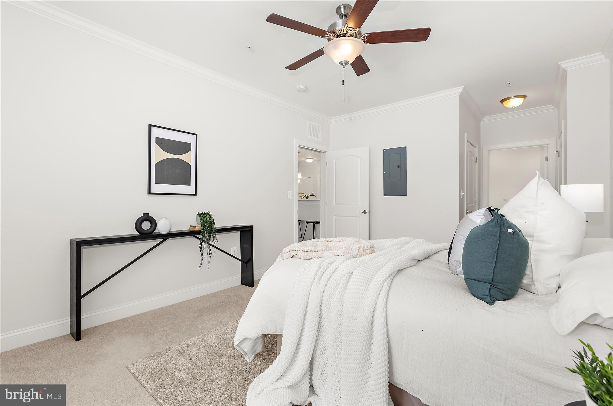 636 Wallingford Road, Unit 3J Bel Air, MD 21014 - Photo 25 of 59 a bedroom with a bed and a painting on the wall