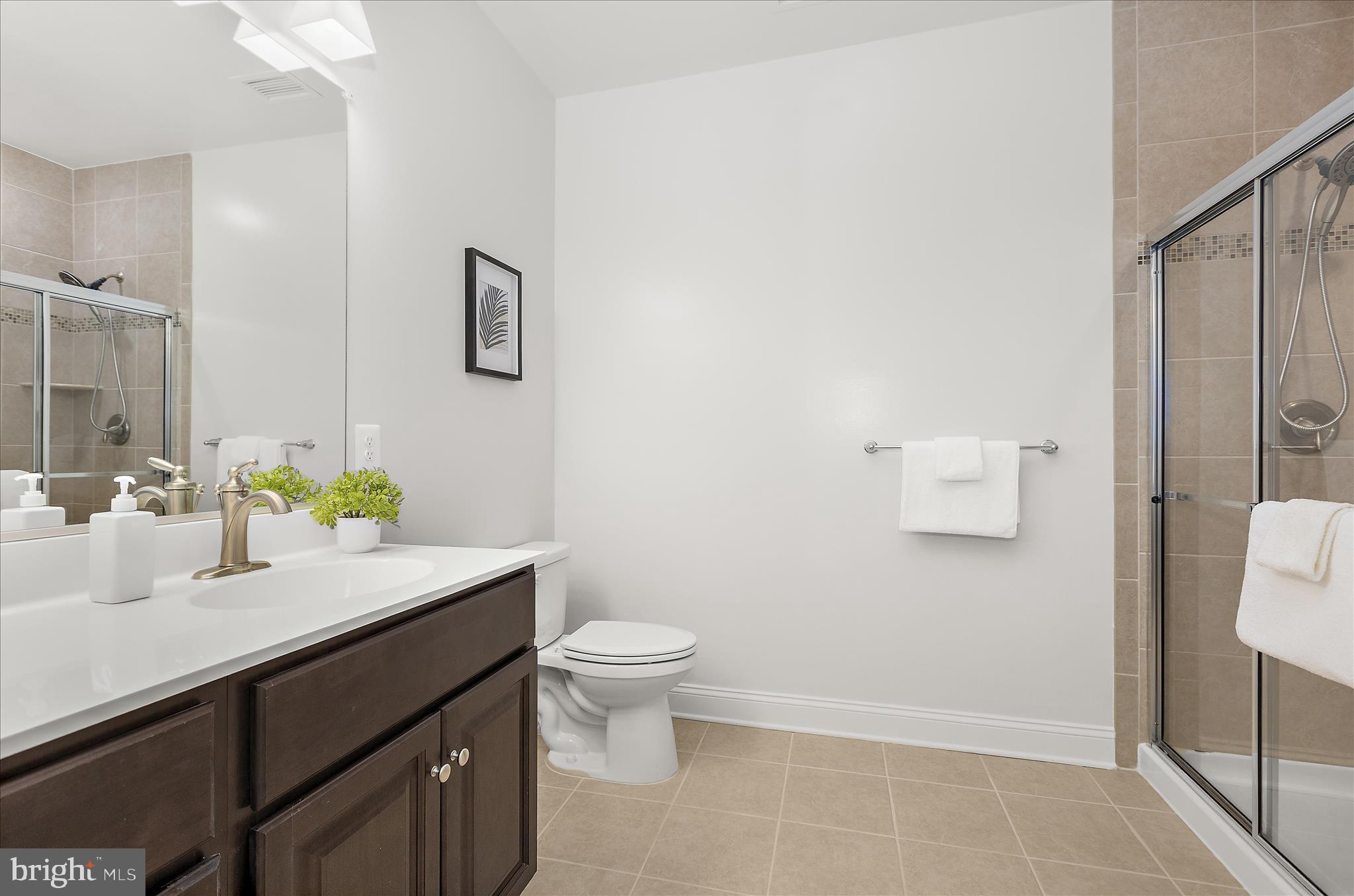 636 Wallingford Road, Unit 3J Bel Air, MD 21014 - Photo 27 of 59 a bathroom with a sink a toilet and shower