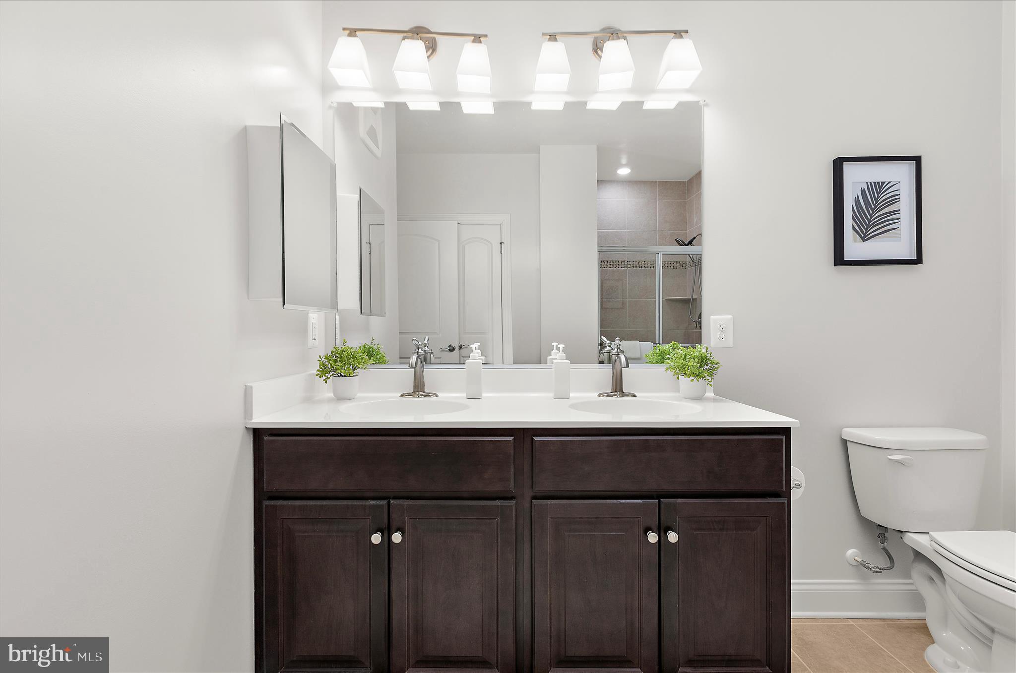 636 Wallingford Road, Unit 3J Bel Air, MD 21014 - Photo 29 of 59 a bathroom with a sink and a toilet