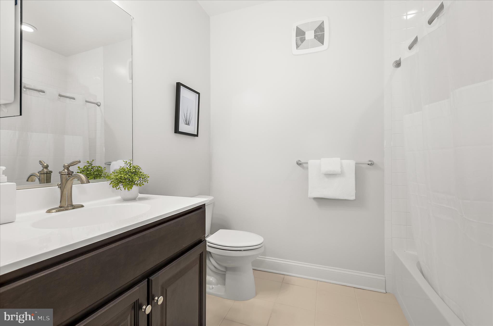 636 Wallingford Road, Unit 3J Bel Air, MD 21014 - Photo 33 of 59 a bathroom with a sink a toilet and a mirror
