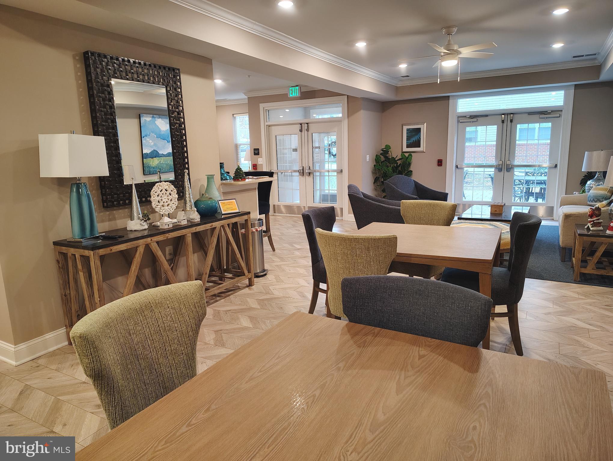 636 Wallingford Road, Unit 3J Bel Air, MD 21014 - Photo 50 of 59 a living room with furniture wooden floor and a view of kitchen