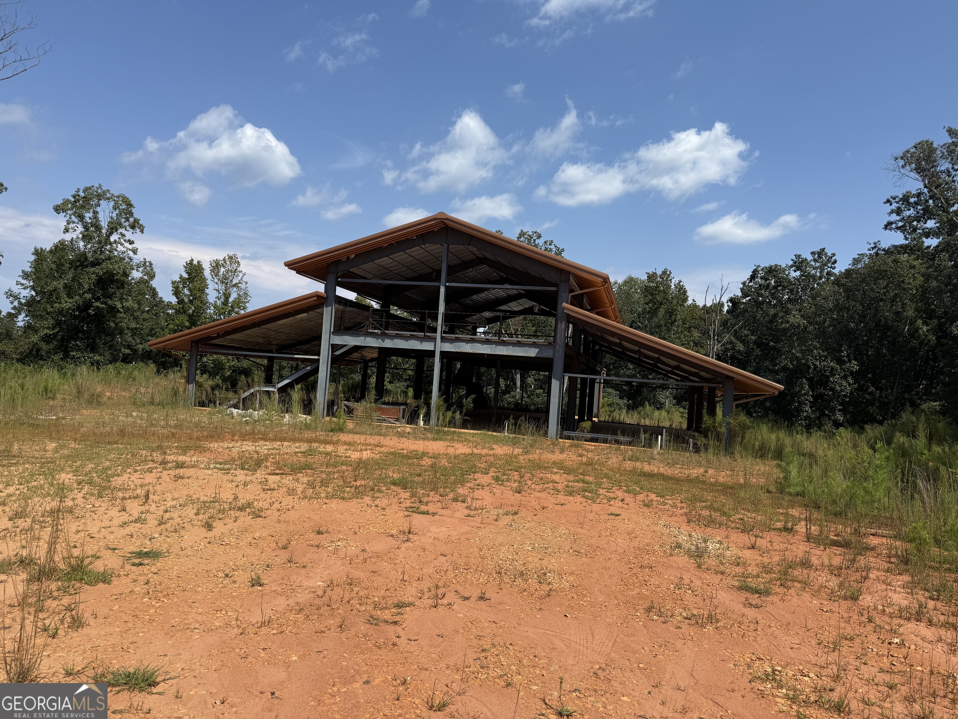 2355 Price Road Martin, GA 30557 - Photo 3 of 18 a view of a wooden house with a yard