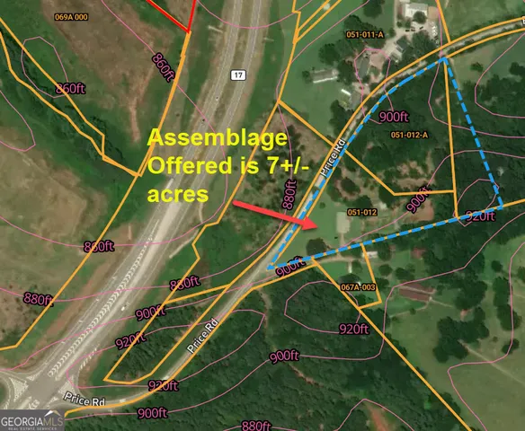 a tennis court with lots of palm trees in the background