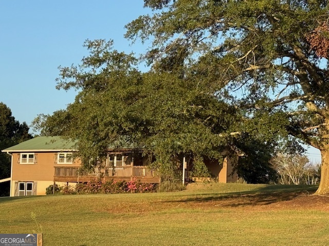 2355 Price Road Martin, GA 30557 - Photo 8 of 18 a view of a house with a yard