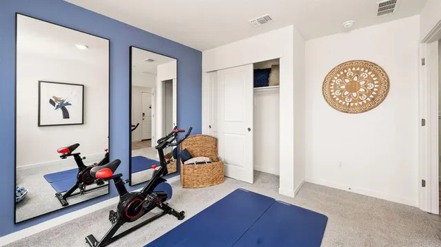a view of a room with gym equipment