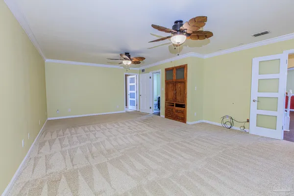 a view of an empty walk in closet