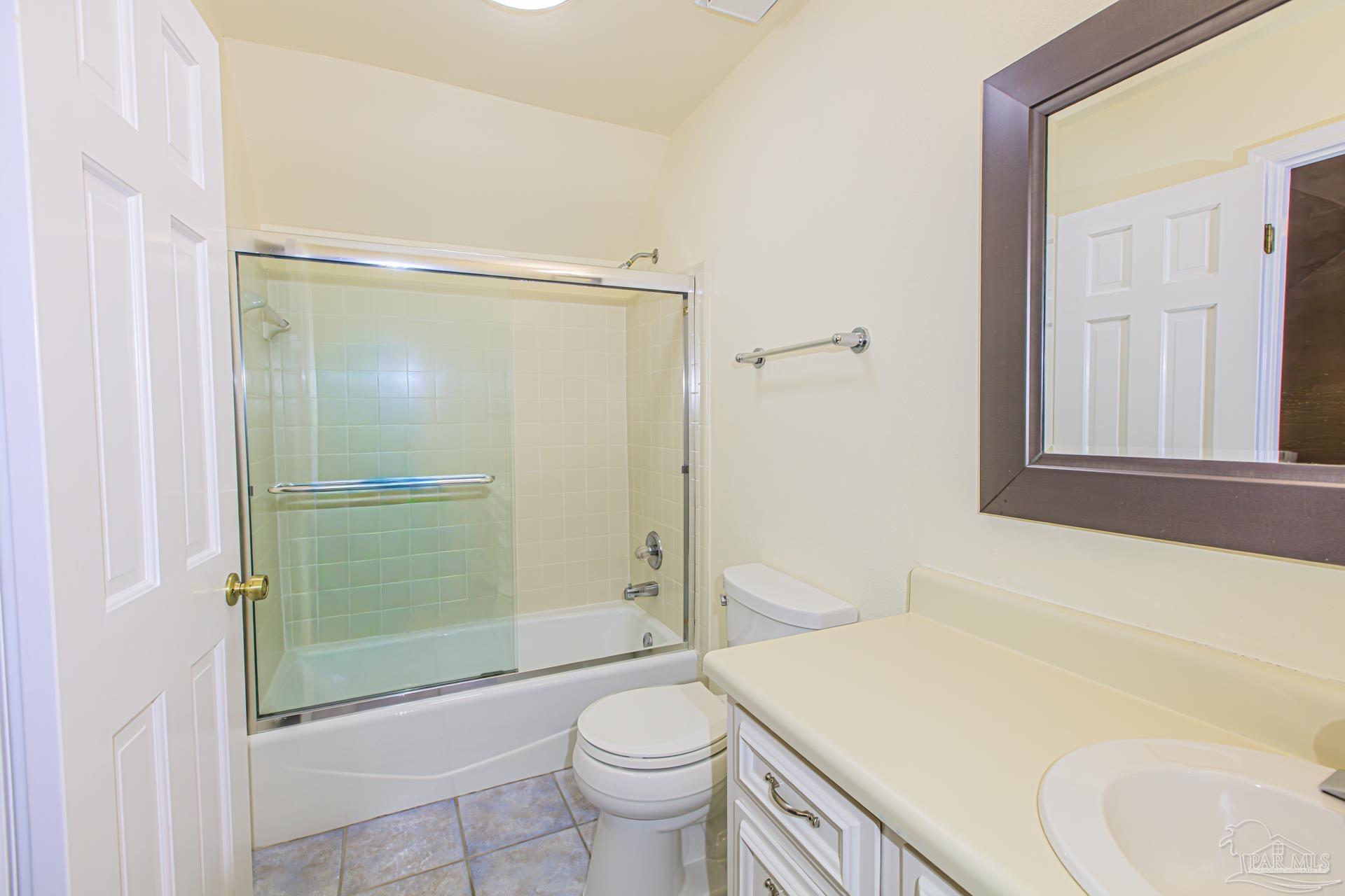 3777 Scenic Ridge Drive Pensacola, FL 32514 - Photo 34 of 67 a bathroom with a sink toilet and shower