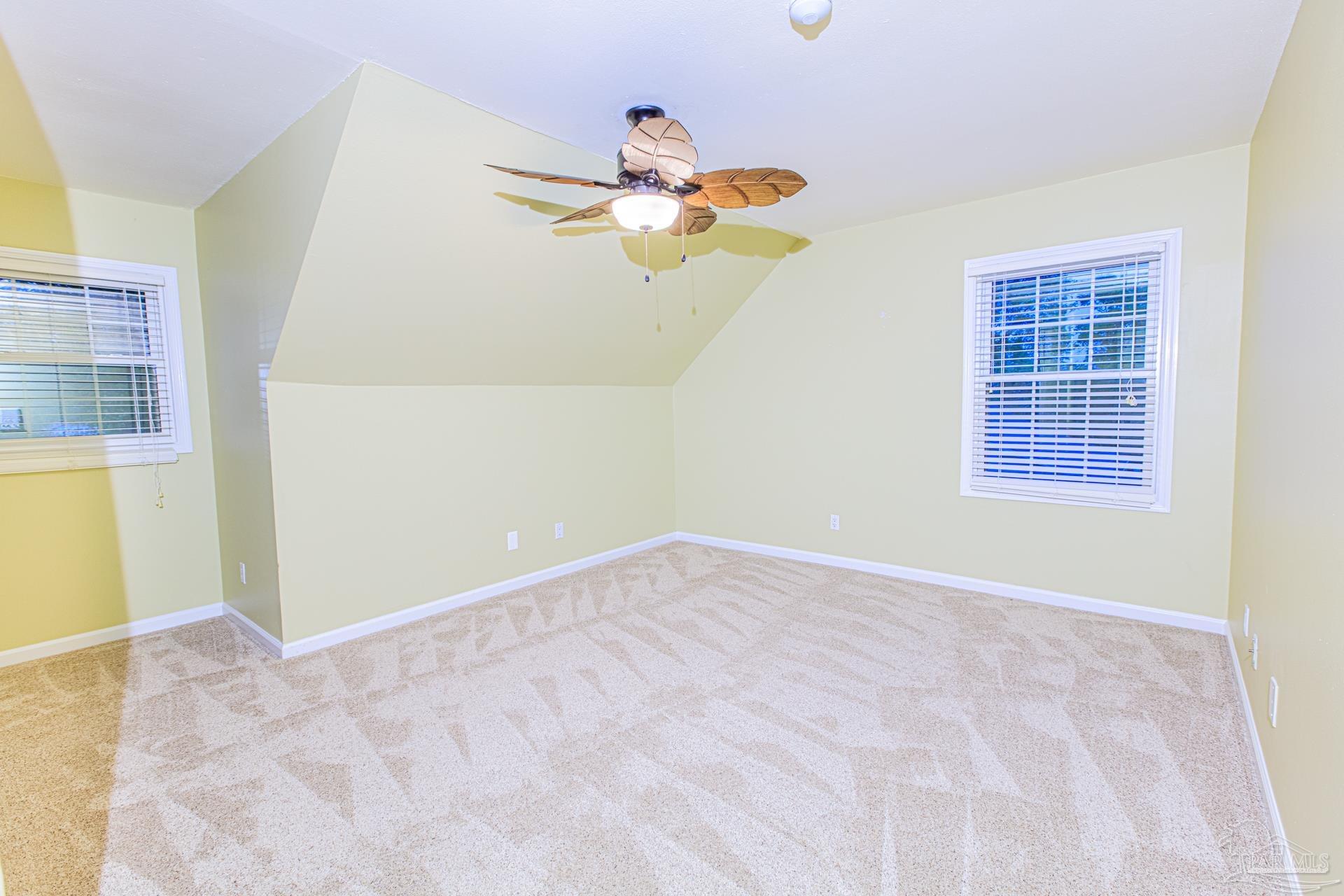 3777 Scenic Ridge Drive Pensacola, FL 32514 - Photo 42 of 67 a view of empty room with wooden floor and fan