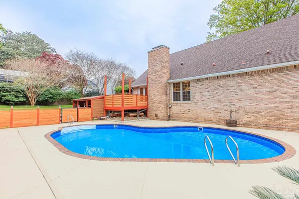 an aerial view of house with yard