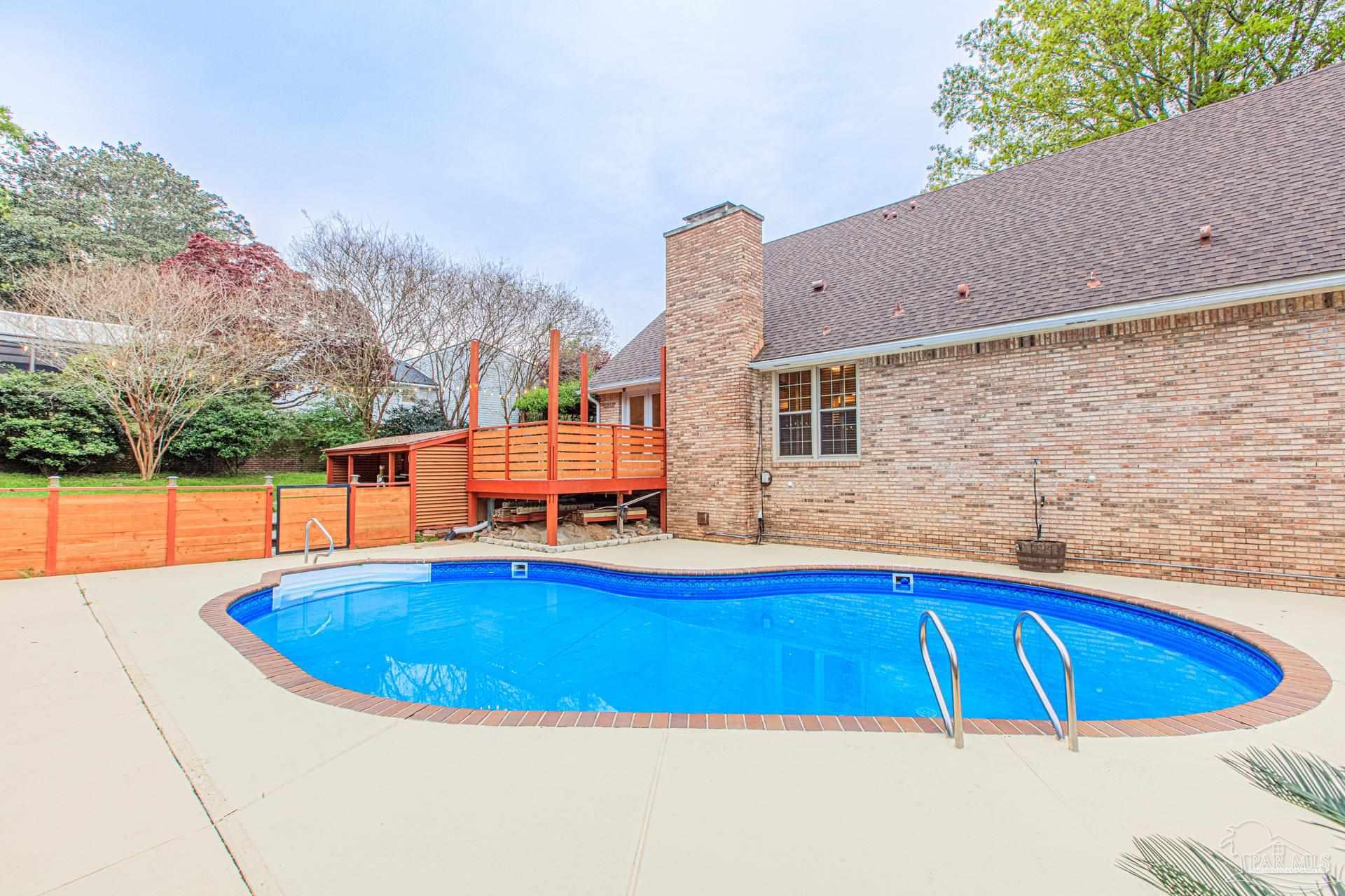 3777 Scenic Ridge Drive Pensacola, FL 32514 - Photo 49 of 67 a view of swimming pool with seating area