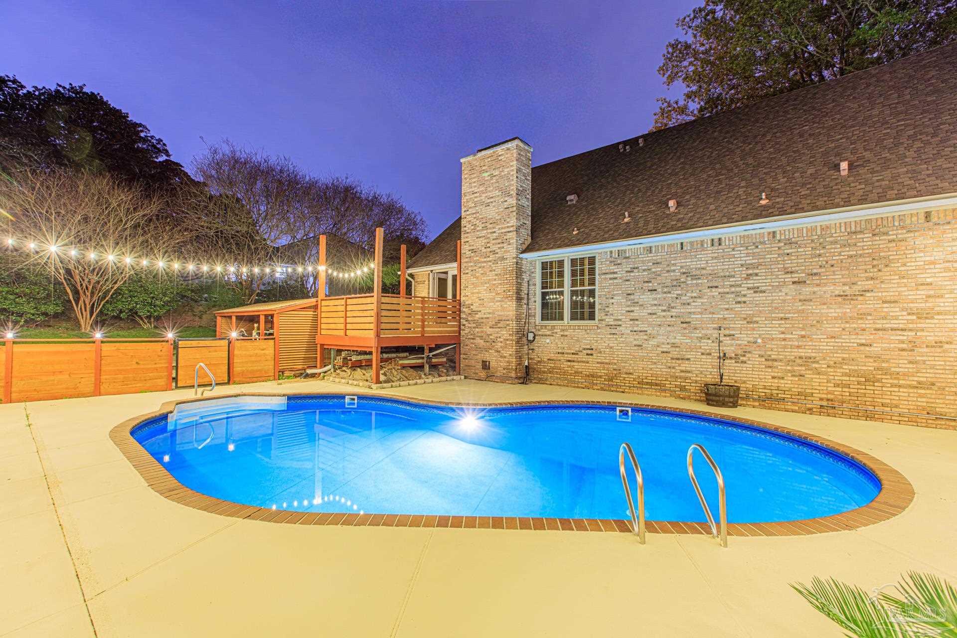 3777 Scenic Ridge Drive Pensacola, FL 32514 - Photo 59 of 67 a view of swimming pool with outdoor seating