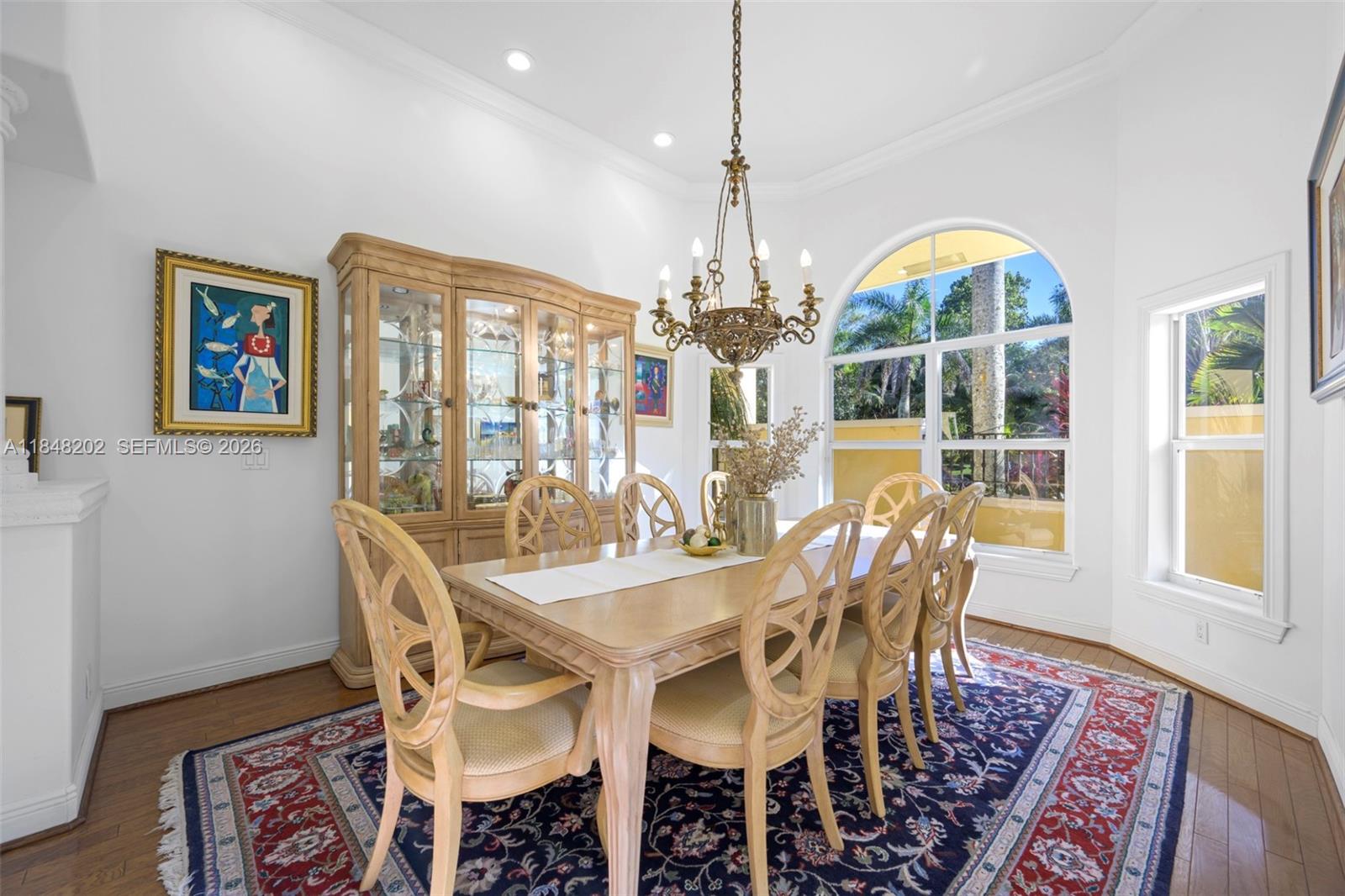 14211 Southwest 63rd Street Southwest Ranches, FL 33330 - Photo 21 of 81 a view of a dining room with furniture window and wooden floor