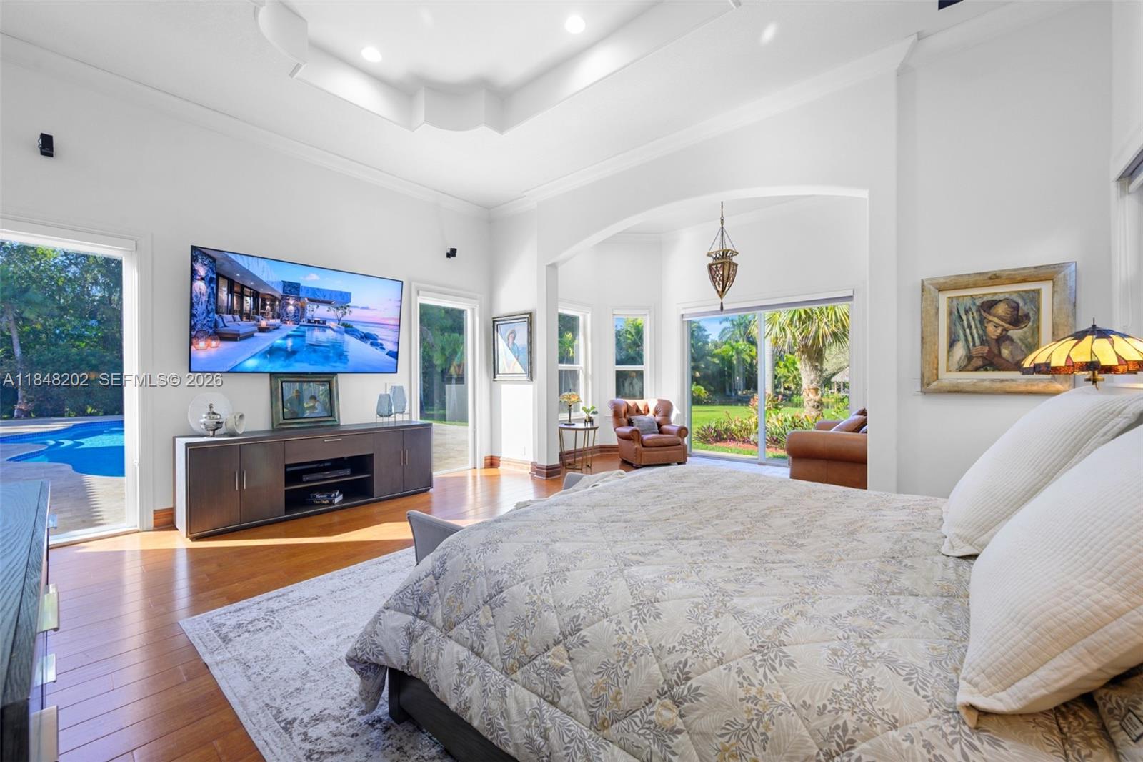 14211 Southwest 63rd Street Southwest Ranches, FL 33330 - Photo 28 of 81 a living room with furniture and a fireplace