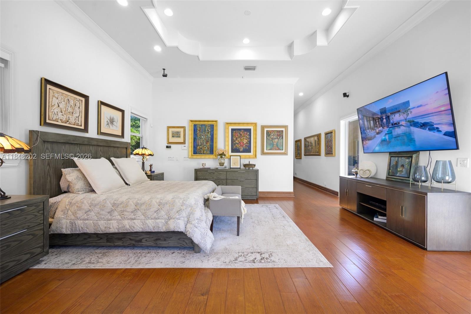 14211 Southwest 63rd Street Southwest Ranches, FL 33330 - Photo 29 of 81 a living room with furniture and a flat screen tv