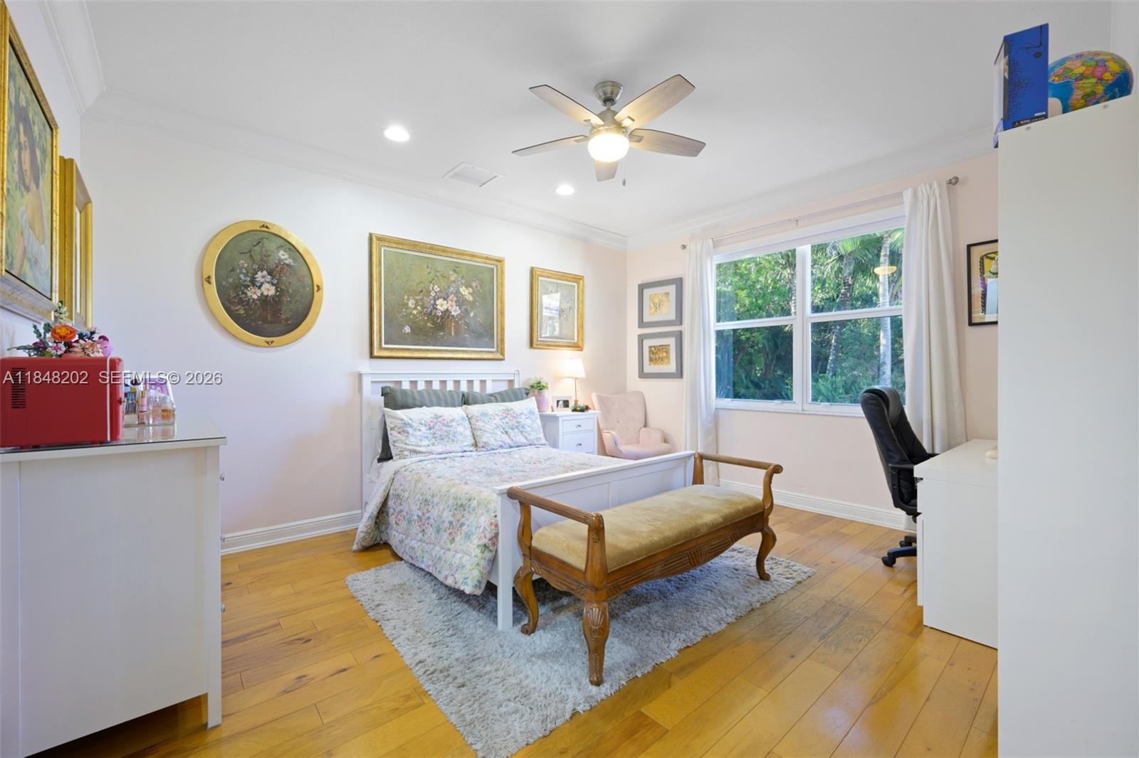 14211 Southwest 63rd Street Southwest Ranches, FL 33330 - Photo 45 of 81 a bedroom with a bed and window