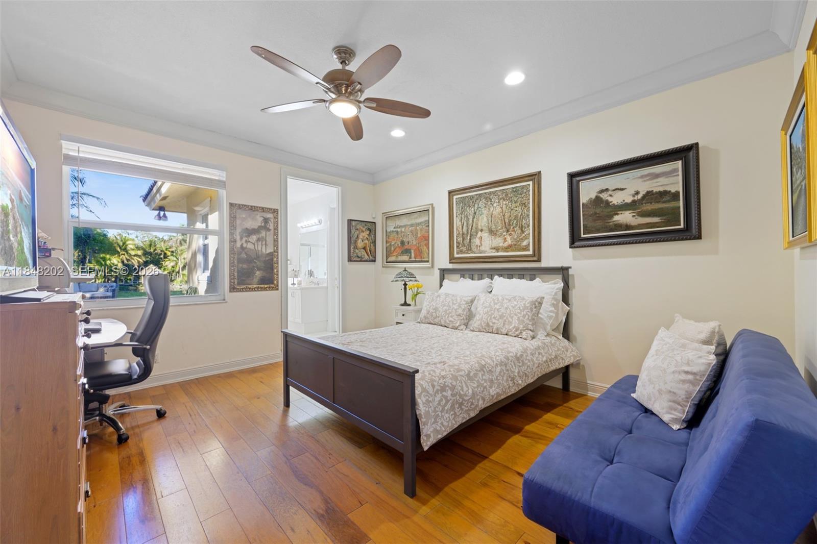 14211 Southwest 63rd Street Southwest Ranches, FL 33330 - Photo 46 of 81 a living room with furniture and a wooden floor