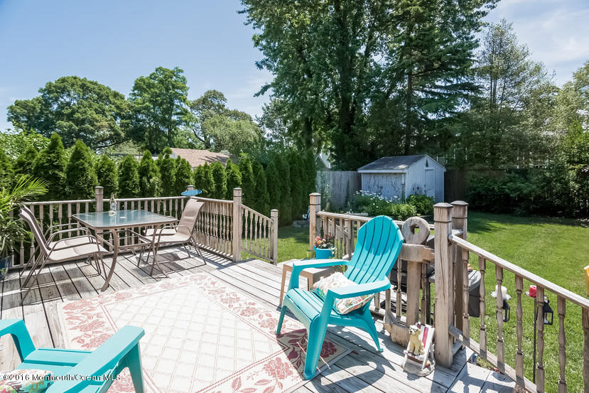 737 Wall Road Spring Lake Heights, NJ 07762 - Photo 19 of 26 a view of a chairs and table on the deck