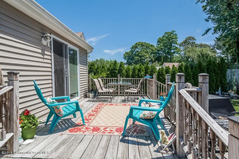 737 Wall Road Spring Lake Heights, NJ 07762 - Photo 20 of 26 a view of deck with furniture and trees
