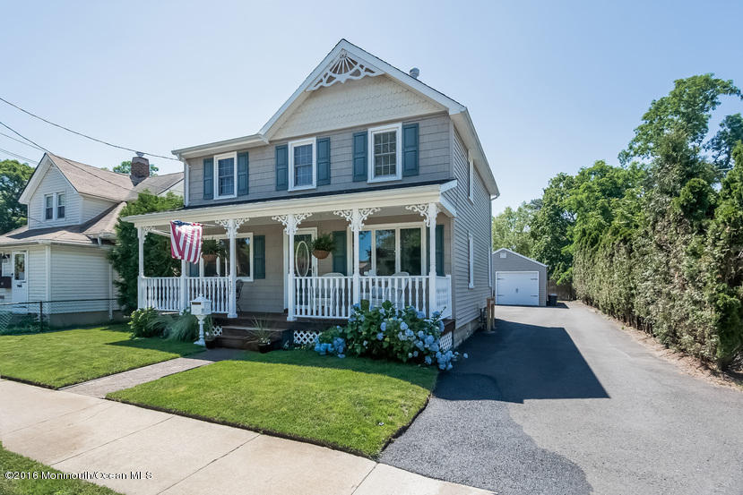 737 Wall Road Spring Lake Heights, NJ 07762 - Photo 2 of 26 a front view of a house with garden