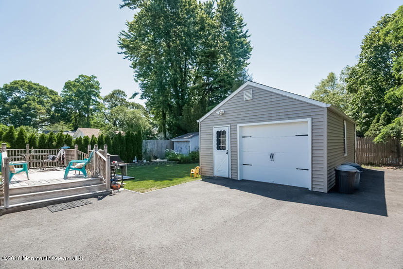 737 Wall Road Spring Lake Heights, NJ 07762 - Photo 24 of 26 a view of a house with backyard and a garden