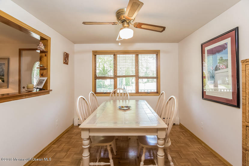 737 Wall Road Spring Lake Heights, NJ 07762 - Photo 9 of 26 a view of a dining room with furniture and window