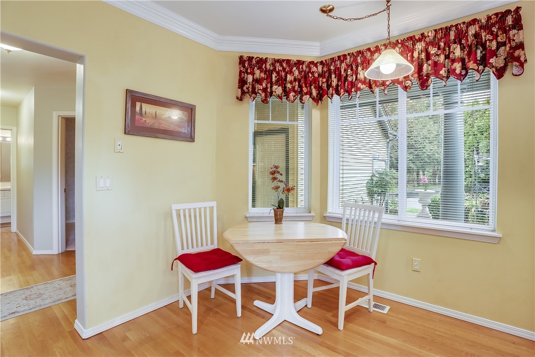 672 Chelan Place Northeast Renton, WA 98059 - Photo 13 of 24 a room with furniture and wooden floor