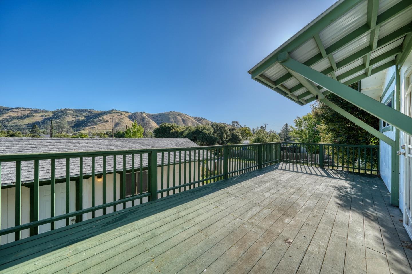 13590 Fair Oak Road Clearlake, CA 95422 - Photo 18 of 27 a view of balcony with wooden floor and outdoor space