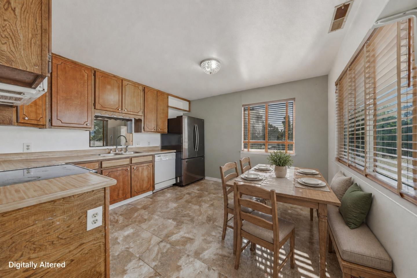 13590 Fair Oak Road Clearlake, CA 95422 - Photo 5 of 27 a kitchen with stainless steel appliances kitchen island granite countertop a sink a stove a refrigerator cabinets and chairs