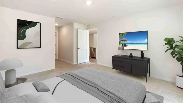 a bed room with a bed and a couch