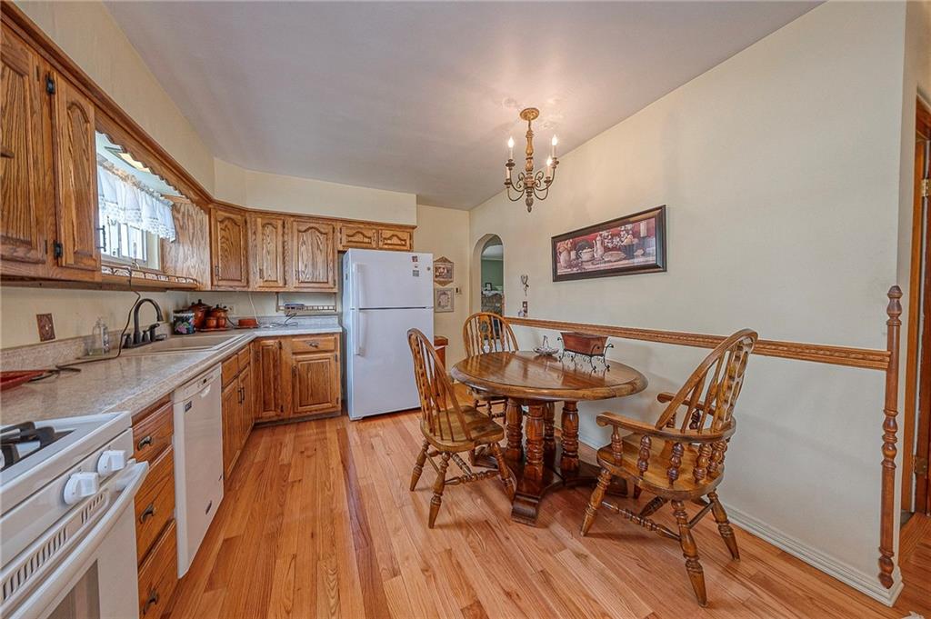 699 Kaye Avenue Monaca, PA 15061 - Photo 13 of 43 a view of a dining room with furniture and wooden floor