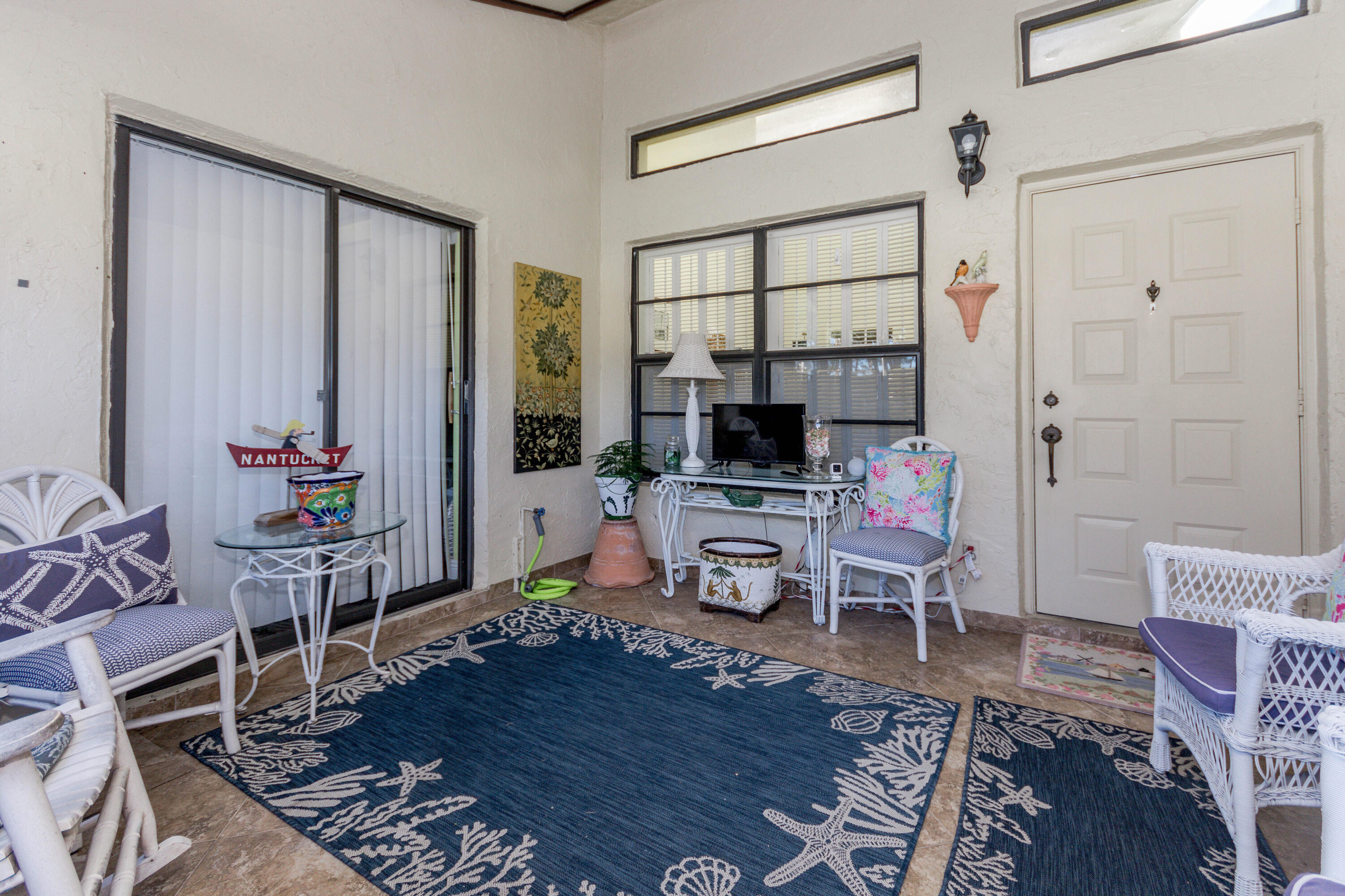 13947 Nesting Way, Unit C Delray Beach, FL 33484 - Photo 5 of 28 Screened In Porch