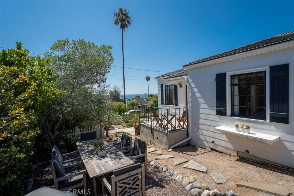 500 Mountain Road Laguna Beach, CA 92651 - Photo 16 of 36 a view of a house with backyard sitting area and tub