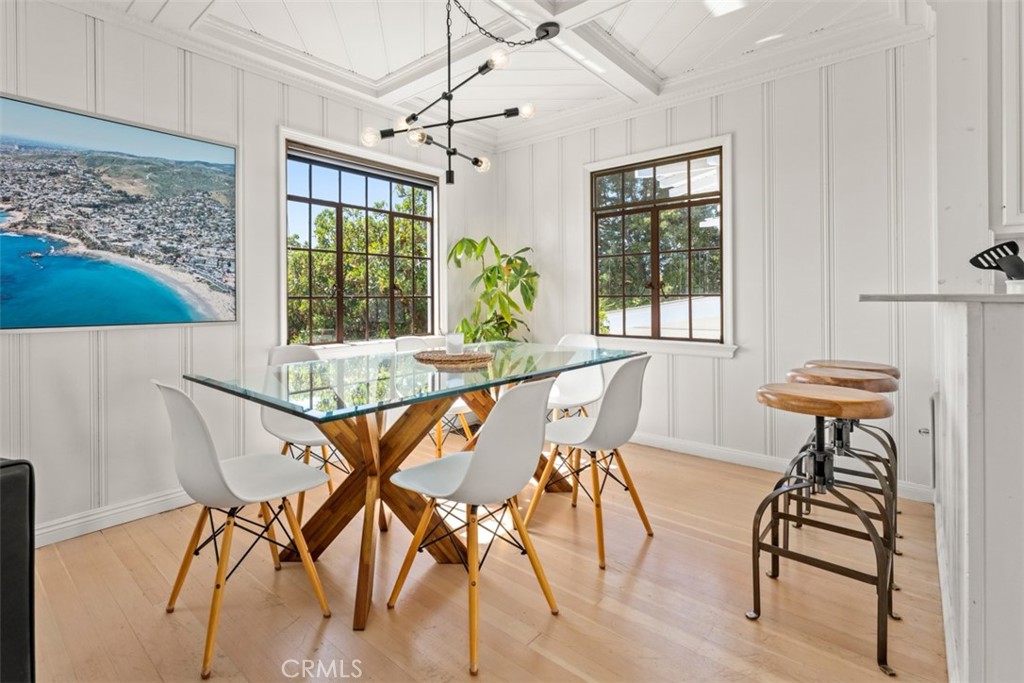 500 Mountain Road Laguna Beach, CA 92651 - Photo 8 of 36 a view of a dining room with furniture window and outside view