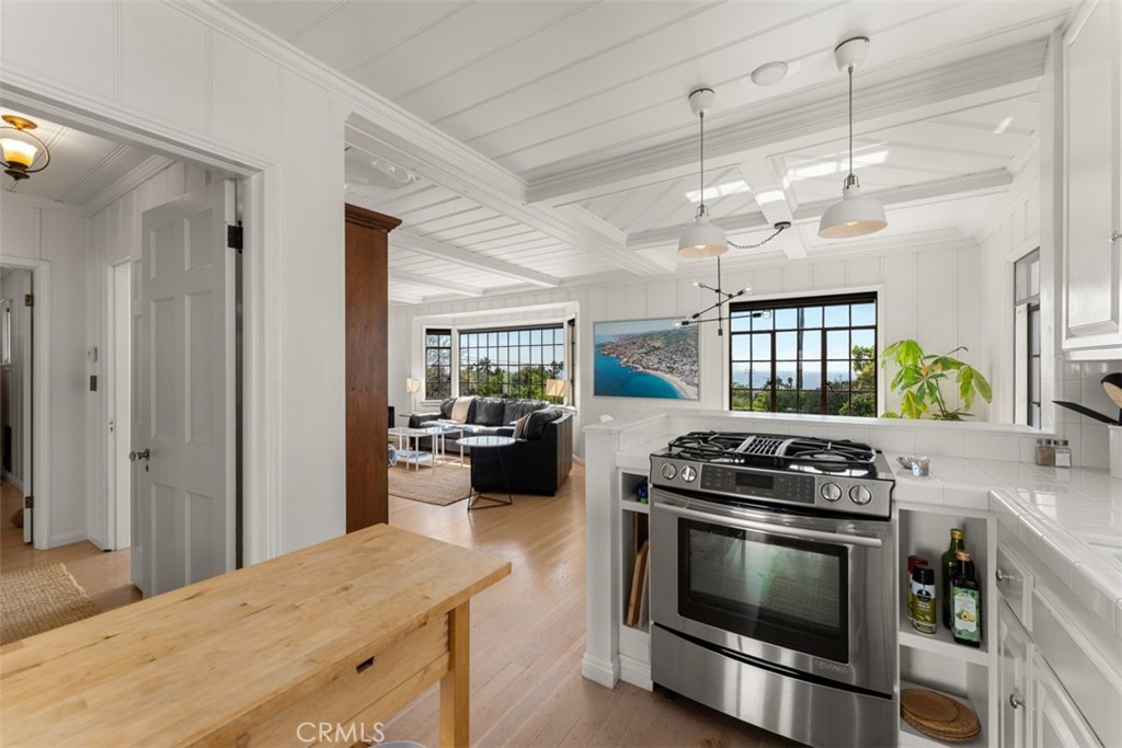 500 Mountain Road Laguna Beach, CA 92651 - Photo 10 of 36 a kitchen with a stove and a sink