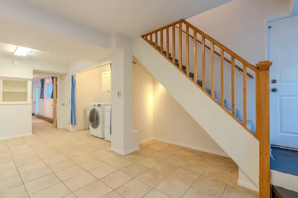a view of an entryway with staircase