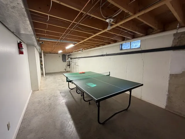 a view of balcony with wooden floor and fence