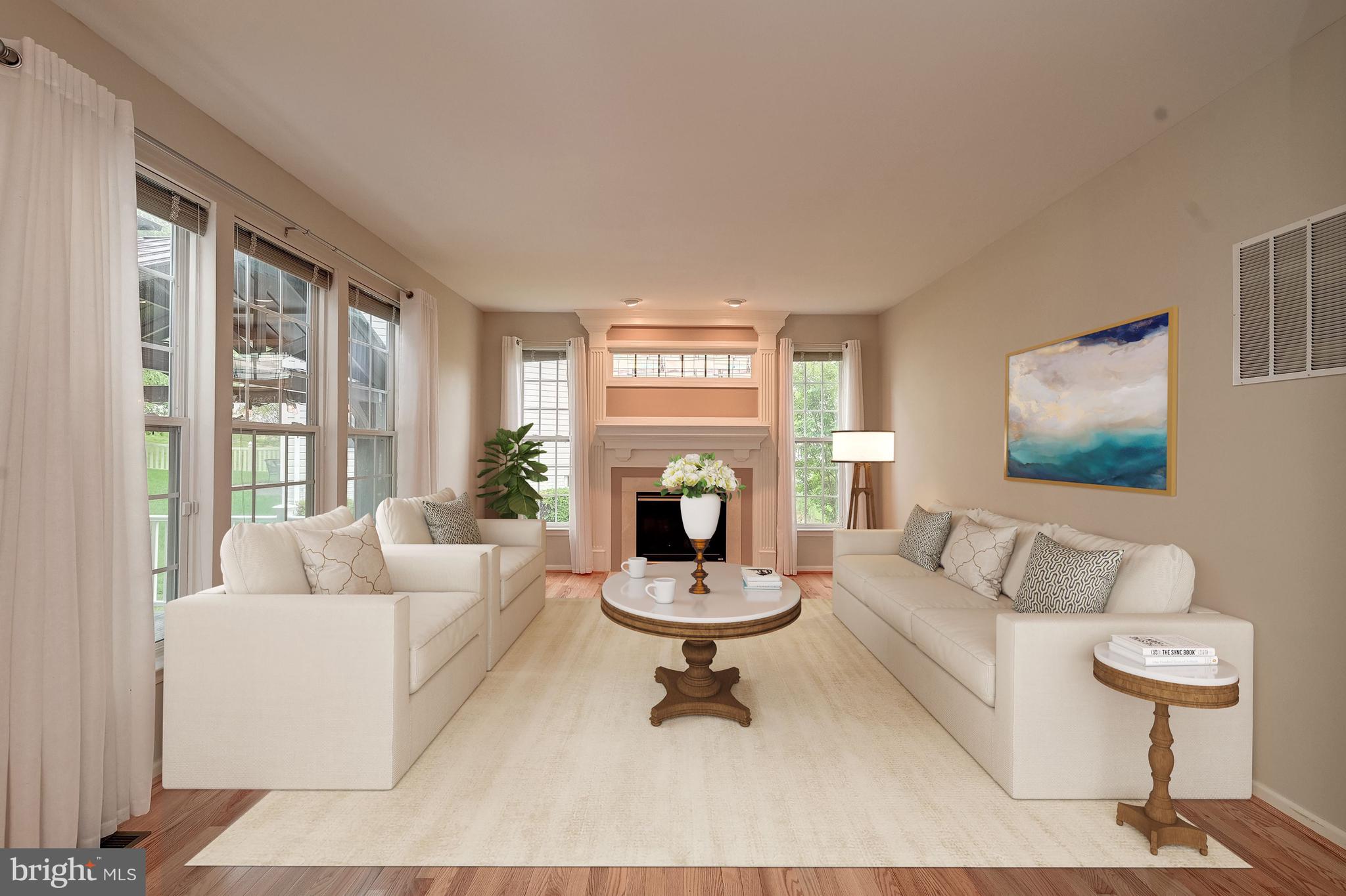 5607 Honeygo Ridge Court White Marsh, MD 21162 - Photo 13 of 47 Living Room Staged Using Virtual Tools