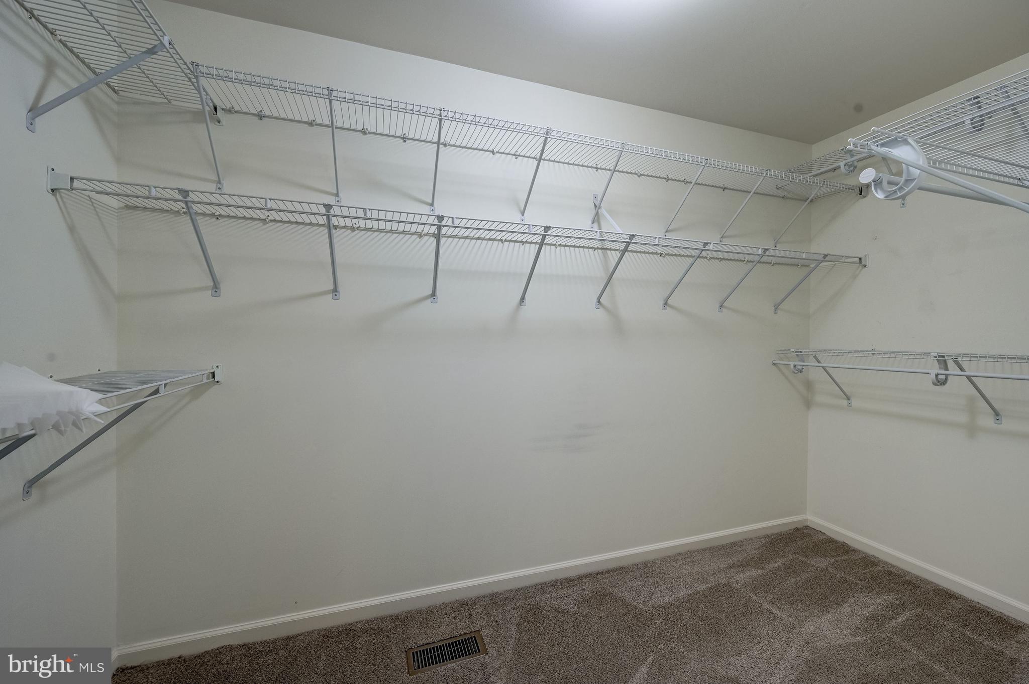 5607 Honeygo Ridge Court White Marsh, MD 21162 - Photo 21 of 47 Primary Bedroom Suite Walk-In Closet