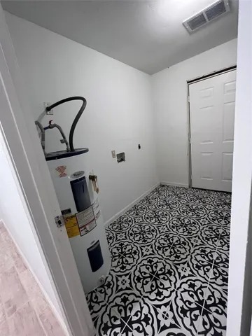 a bedroom with a bed and cabinets