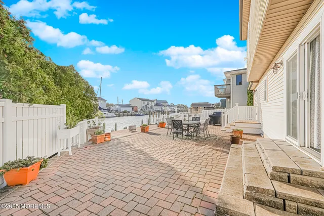 a view of a terrace with chairs