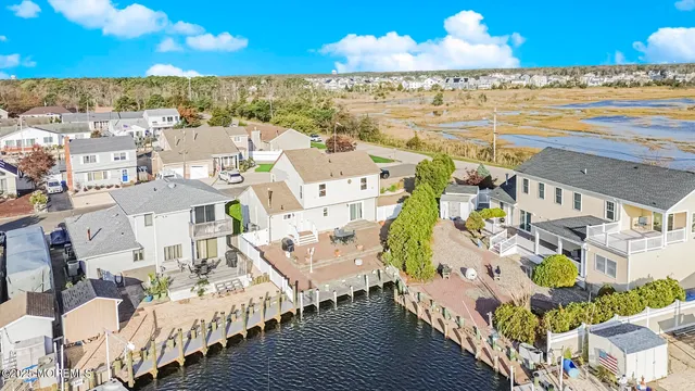 a living room with furniture wooden floor and a rug