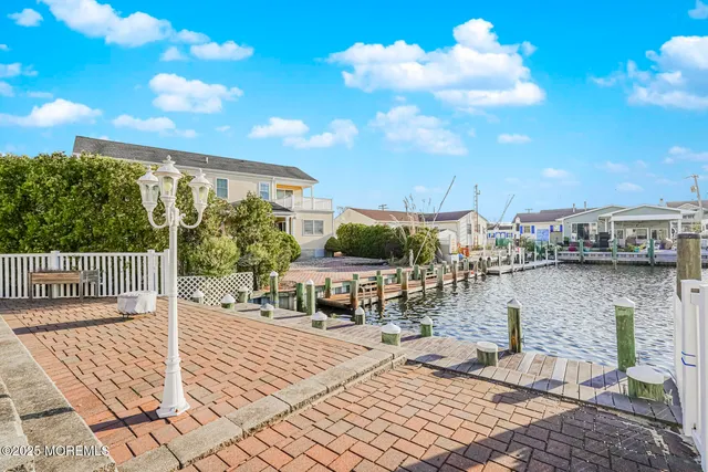 a view of balcony with furniture