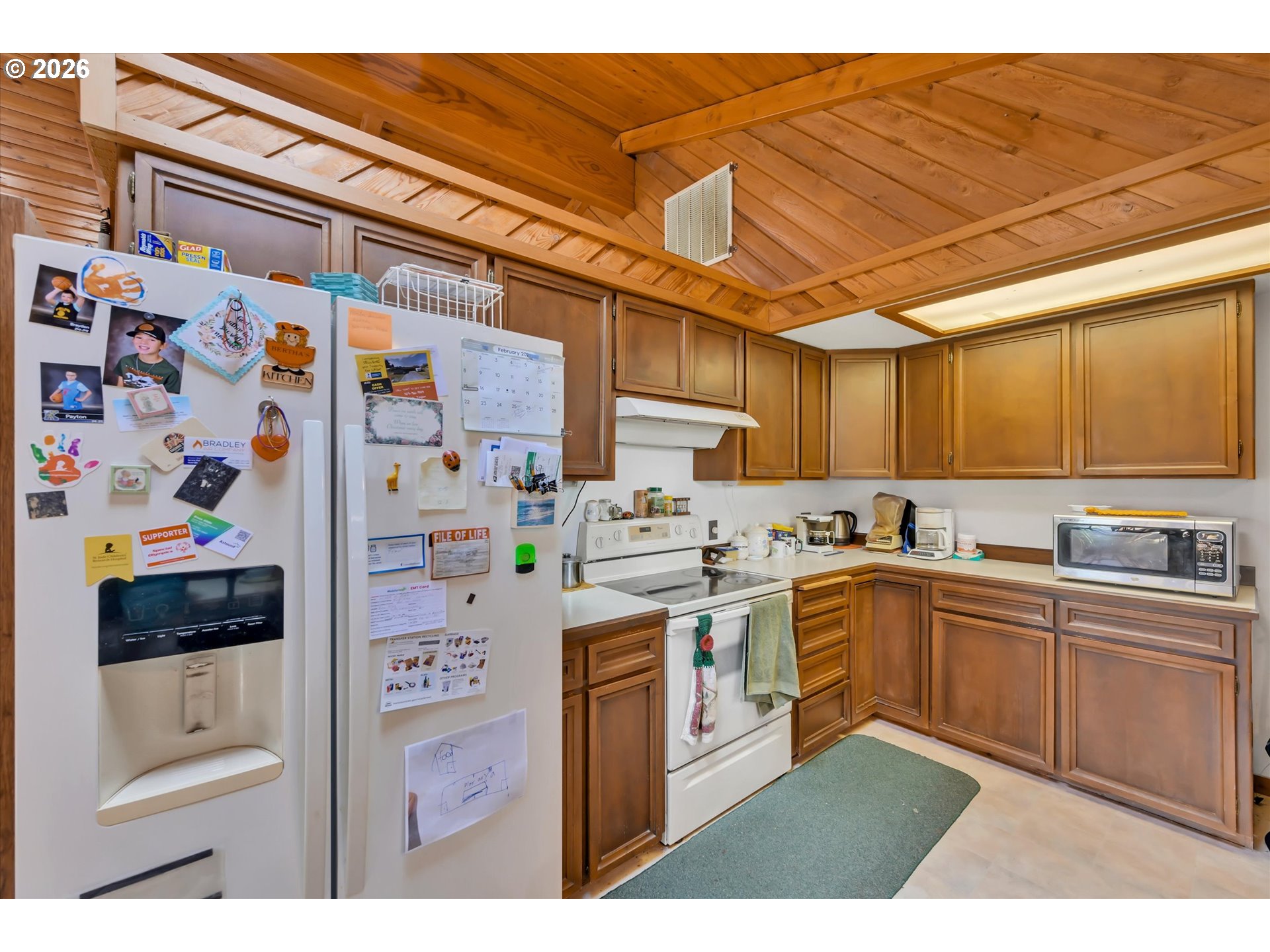 91 Godfrey Road Mossyrock, WA 98564 - Photo 13 of 47 a kitchen with stainless steel appliances a stove a sink and cabinets