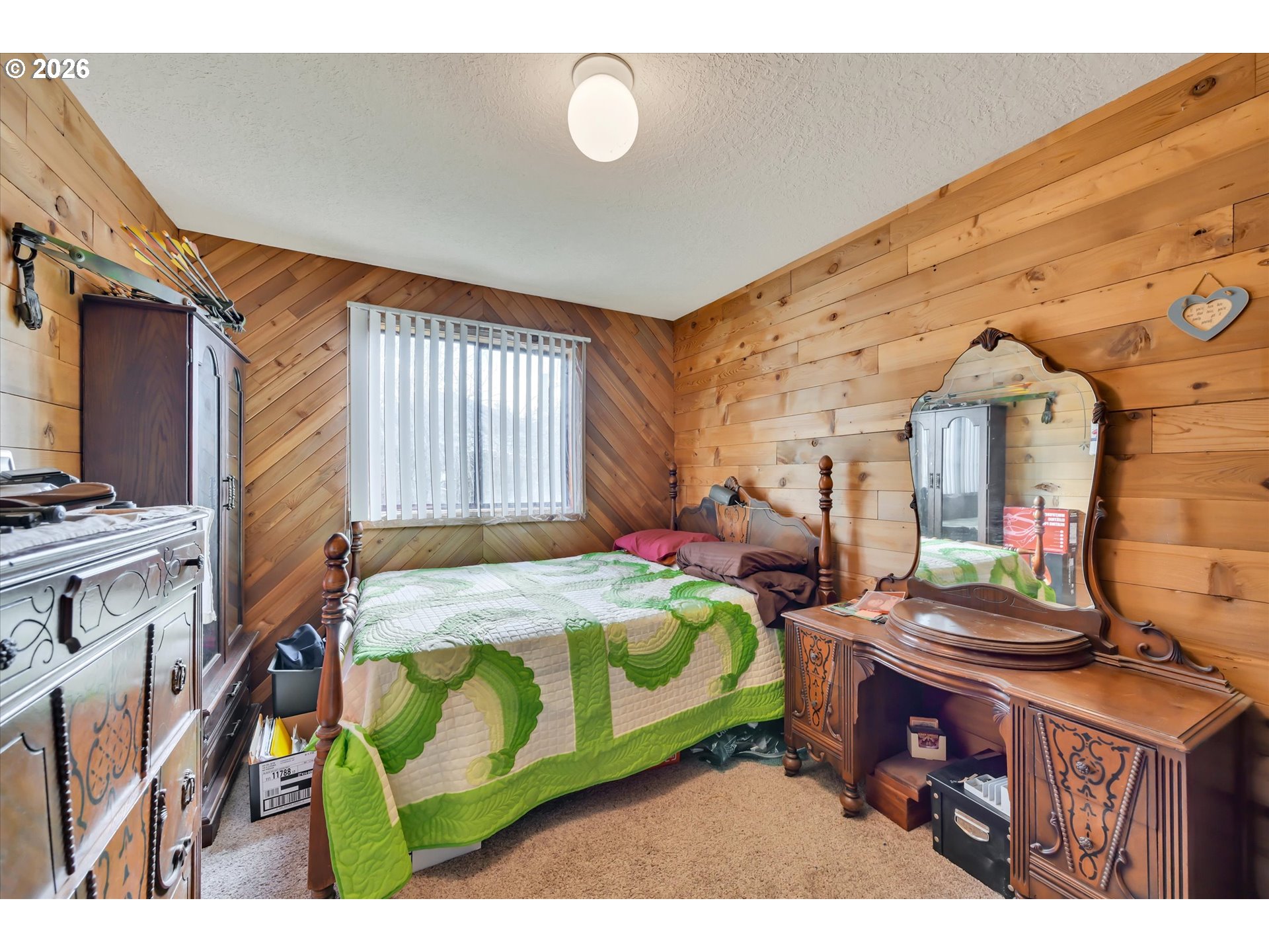 91 Godfrey Road Mossyrock, WA 98564 - Photo 19 of 47 a bedroom with a bed next to a window